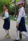 North Korea: Kids cleaning the streets of Pyongyang